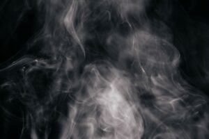 brown-wavy-smoke-black-background (Large)